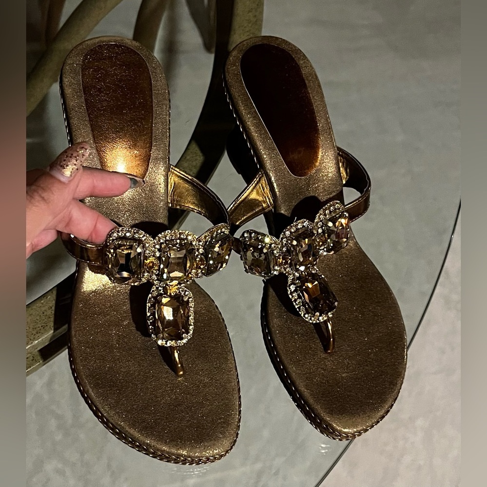 Brand NEW! Metallic brown wedge sandals with Crystals. Size 8.